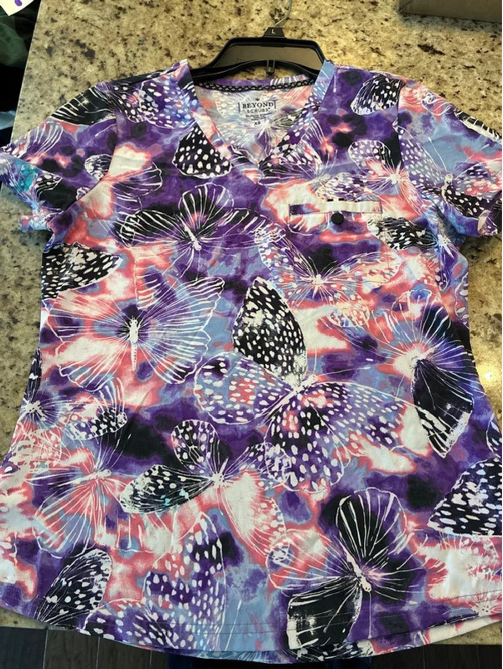 Butterfly scrub top